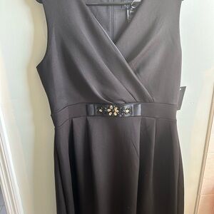 Never worn size 14 black cocktail dress.  Hi/low hem